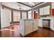 Open concept kitchen with island, stainless steel appliances, and ample natural light at 3082 Monarch Pine Dr, Peachtree Corners, GA 30071
