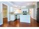 Modern kitchen with white cabinets, stainless steel appliances, and an open layout at 3082 Monarch Pine Dr, Peachtree Corners, GA 30071