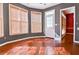 Bright kitchen area with wood floors, large windows, and access to the outdoor at 3082 Monarch Pine Dr, Peachtree Corners, GA 30071