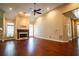 Spacious living room with hardwood floors, a fireplace, and lots of natural light at 3082 Monarch Pine Dr, Peachtree Corners, GA 30071