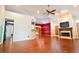 Spacious living room with hardwood floors, fireplace, and ceiling fan at 3082 Monarch Pine Dr, Peachtree Corners, GA 30071