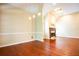 Living room with hardwood floors, a fireplace, and ample space for seating at 3082 Monarch Pine Dr, Peachtree Corners, GA 30071