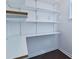 Walk-in pantry with adjustable shelving for easy storage of food and kitchen items at 3082 Monarch Pine Dr, Peachtree Corners, GA 30071