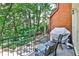 Relax on this outdoor balcony overlooking the wooded backyard at 4476 Paces Battle Nw, Atlanta, GA 30327