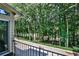 Enjoy outdoor living on this balcony overlooking the lush trees and peaceful surroundings at 4476 Paces Battle Nw, Atlanta, GA 30327