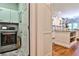 Easy access to the kitchen from the laundry room in this home at 4476 Paces Battle Nw, Atlanta, GA 30327