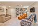 Spacious living room with built-in bookshelves, comfortable seating, and neutral decor at 4476 Paces Battle Nw, Atlanta, GA 30327