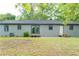 Exterior: View of home with freshly painted siding, backyard with new deck and stairs, and a well maintained lawn at 147 Harris Loop, Dallas, GA 30157