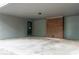 Large covered carport with brick accent wall, offering protection and parking for vehicles at 147 Harris Loop, Dallas, GA 30157