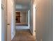 Hallway leading to living room and kitchen at 147 Harris Loop, Dallas, GA 30157