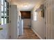 Functional laundry room with storage cabinets, and tile floors, providing a practical space for household chores at 147 Harris Loop, Dallas, GA 30157