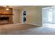 Spacious living room features a stone fireplace and neutral carpeting at 147 Harris Loop, Dallas, GA 30157