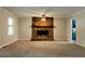 Spacious living room with stone fireplace at 147 Harris Loop, Dallas, GA 30157