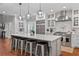 Spacious kitchen featuring a large center island with seating and stainless steel appliances at 18 Starlight Dr, Cartersville, GA 30121