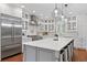 Stunning kitchen featuring a large island, stainless steel appliances, and custom cabinetry at 18 Starlight Dr, Cartersville, GA 30121