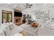 Inviting living room features a cozy fireplace, French doors, and comfortable seating arrangement at 18 Starlight Dr, Cartersville, GA 30121