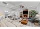 Bright living room with a brick fireplace, a coffered ceiling, and an open concept design at 18 Starlight Dr, Cartersville, GA 30121