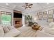 Cozy living room with a brick fireplace and access to an outdoor balcony at 18 Starlight Dr, Cartersville, GA 30121
