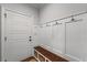 Inviting mudroom features wainscoting, bench seating, storage baskets and hooks at 18 Starlight Dr, Cartersville, GA 30121