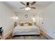 Spacious bedroom with a comfortable bed, soft lighting, and hardwood floors, creating a relaxing atmosphere at 944 Hardy Cir, Dallas, GA 30157