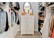Organized walk-in closet with built-in shelving and drawers, providing ample storage space at 944 Hardy Cir, Dallas, GA 30157