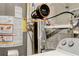 Close-up of the modern water heater and filtration system at 944 Hardy Cir, Dallas, GA 30157