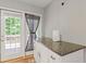 Kitchen countertop with door leading out to deck at 109 Riley Way, Canton, GA 30115