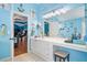 Bathroom featuring a vanity, large mirrors, and charming decor at 1162 Apalachee Run Trl, Dacula, GA 30019