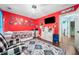 Bedroom featuring a TV, bed, carpet and gaming-themed decor at 1162 Apalachee Run Trl, Dacula, GA 30019