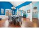Elegant dining area with hardwood floors and a stylish chandelier at 1162 Apalachee Run Trl, Dacula, GA 30019