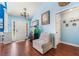 Bright entryway featuring a charming chandelier and comfortable seating area at 1162 Apalachee Run Trl, Dacula, GA 30019