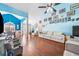 Bright and spacious living room with hardwood floors and plenty of seating at 1162 Apalachee Run Trl, Dacula, GA 30019