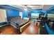 Spacious bedroom features hardwood floors, tray ceilings, and a ceiling fan at 1162 Apalachee Run Trl, Dacula, GA 30019