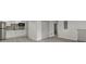 Basement living area featuring a kitchenette and bonus room with sliding door closet at 1253 Willow Dr, Riverdale, GA 30296
