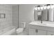 Bright bathroom featuring a tub shower and new fixtures at 1253 Willow Dr, Riverdale, GA 30296