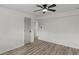 Spacious bedroom with ceiling fan and ensuite bathroom at 1253 Willow Dr, Riverdale, GA 30296