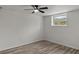 Bright bedroom with ceiling fan and hardwood floors at 1253 Willow Dr, Riverdale, GA 30296