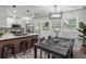 Bright kitchen with modern appliances, sleek countertops, and a dining area at 1253 Willow Dr, Riverdale, GA 30296