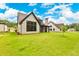 A well-maintained large yard complements this home's backyard at 206 Regester Way, Peachtree City, GA 30269