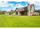 A well-maintained large yard complements this home's backyard at 206 Regester Way, Peachtree City, GA 30269