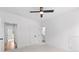 Bright bedroom featuring ceiling fan and two doors at 206 Regester Way, Peachtree City, GA 30269