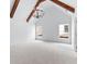 Spacious bedroom with exposed wood beams, a chandelier, and lots of light at 206 Regester Way, Peachtree City, GA 30269