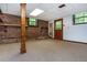 Spacious basement with brick details and natural light at 3549 Dogwood Dr, Powder Springs, GA 30127