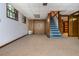 View of partially finished basement with carpet at 3549 Dogwood Dr, Powder Springs, GA 30127