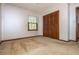 Bedroom featuring carpet, closet and window at 3549 Dogwood Dr, Powder Springs, GA 30127