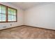 Bedroom with carpeting and lots of natural light at 3549 Dogwood Dr, Powder Springs, GA 30127