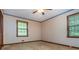 Carpeted bedroom with natural light from a window at 3549 Dogwood Dr, Powder Springs, GA 30127