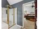 Bathroom view into primary bedroom, showing large glass shower and neutral colors at 840 Yosemite Dr, Suwanee, GA 30024