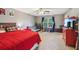 Bright bedroom with desk, daybed, large window, and red dresser at 840 Yosemite Dr, Suwanee, GA 30024