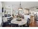 Warm dining area features a hardwood floor with a lovely backyard view at 840 Yosemite Dr, Suwanee, GA 30024